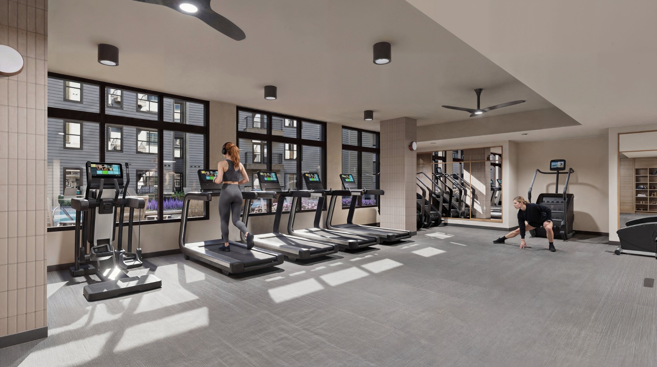 Rendering of residents working out in the upgraded fitness center at 114 Earle